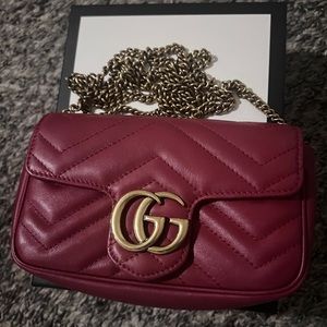 Brand: Gucci Color: Red w/ Gold brand symbol